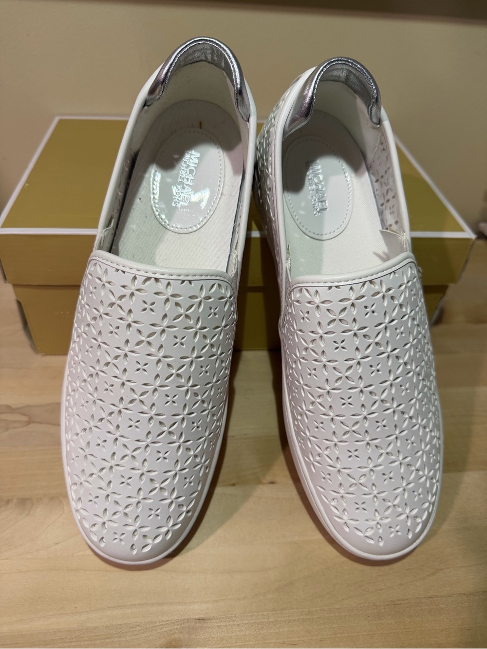 Michael Kors White Perforated Slip-On Sneakers with Silver Heel Accent